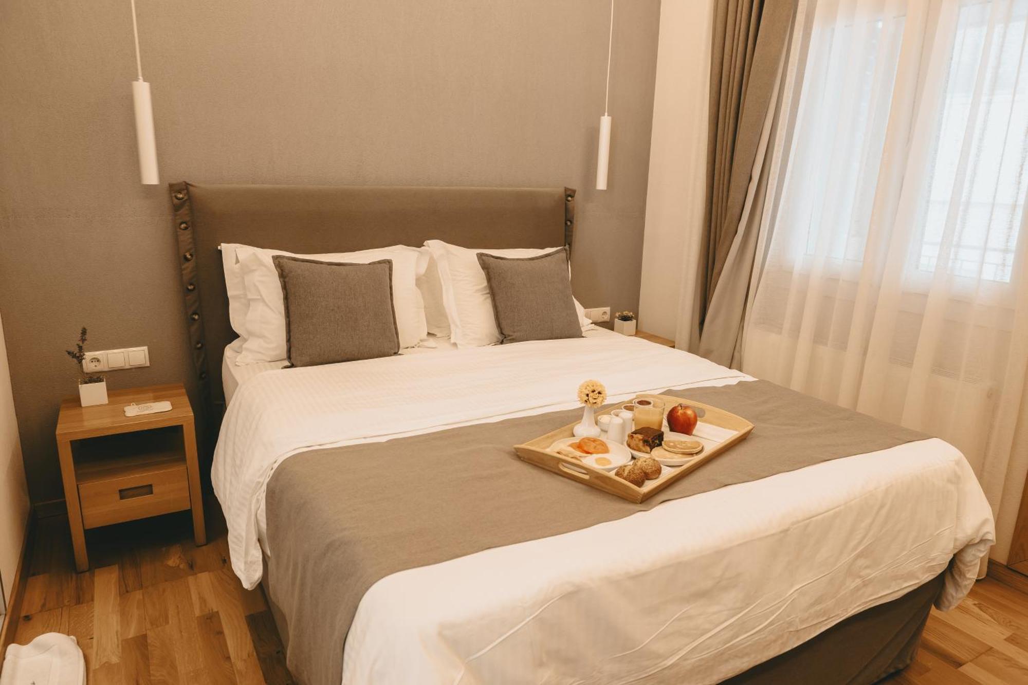 Giardino High Living Suites Dráma Pokoj fotografie